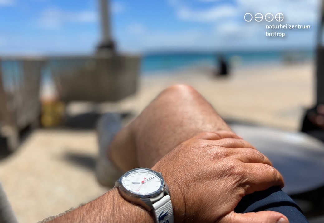 Man on a lounger by the sea