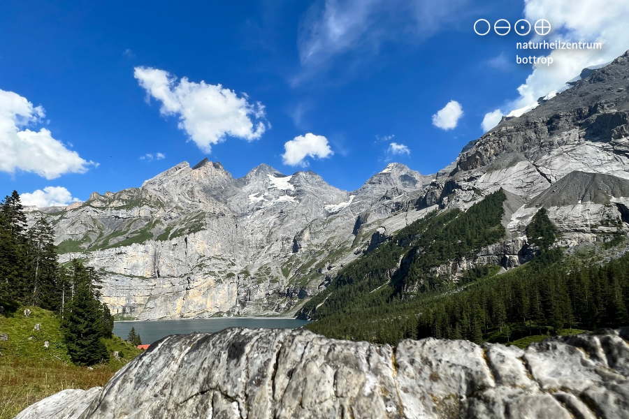 Bright alpine panorama with mountain lake